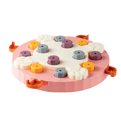 Gâteau jouet interactif rose avec glaçage orange et violet pour la santé digestive du chien Transparent Background