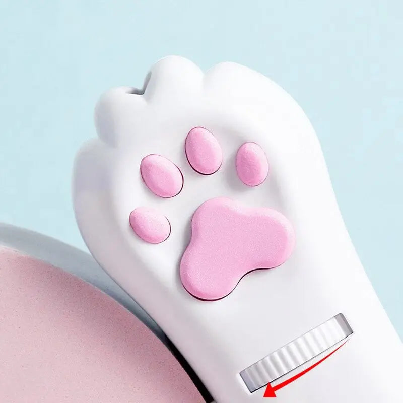 Brosse à dents en forme de patte de chien avec des dents roses et blanches - parfaite pour les moments de jeu avec vos animaux de compagnie